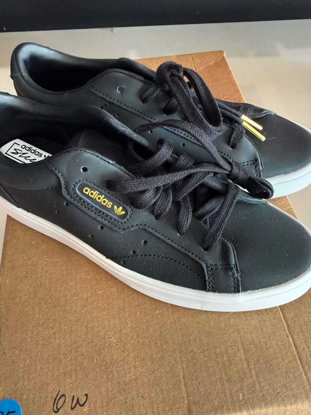 adidas Black Leather Low-Top Sneakers with White Sole and Gold Accents